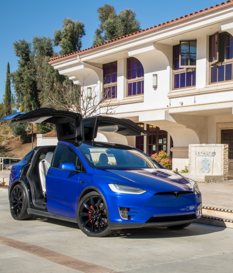 Tesla with open doors